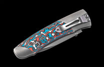 Folding knife with a colorful handle on a black background