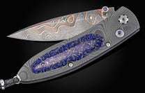 William Henry folding knife with damascus steel and blue lapis lazuli scales. 