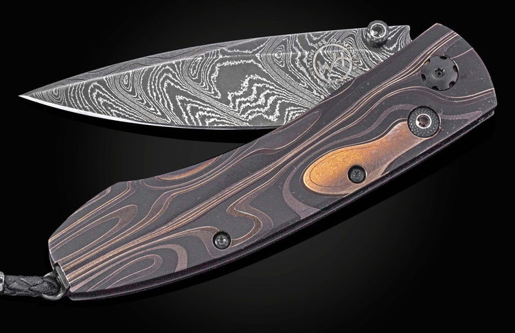 Dark patterned folding knife with wavy damascus blade and dark wood handle by B05, featuring copper inlay and textured screws, side view on black background