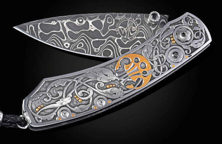 Decorative knife with intricate patterns on a dark background