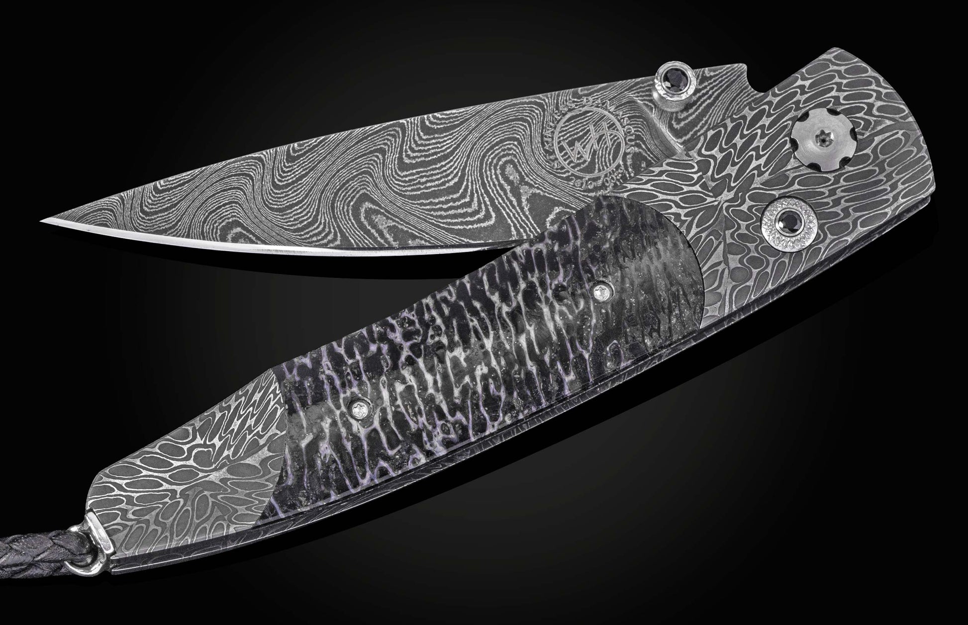 Damascus steel folding knife with wavy pattern and textured handle, by B10 Mammuthus, featuring engraved logo and dark lanyard, side view on black background