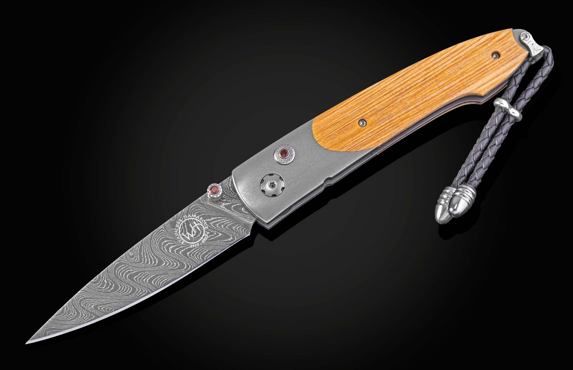 Damascus and titanium folding knife, inlaid with wood from the Gaylord Family Oklahoma Memorial Stadium bleachers