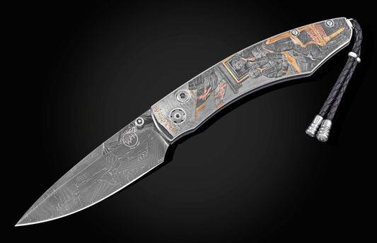 Damascus steel folding knife by B12 with engraved historical scene, copper accents, and braided cord lanyard, side view on black background
