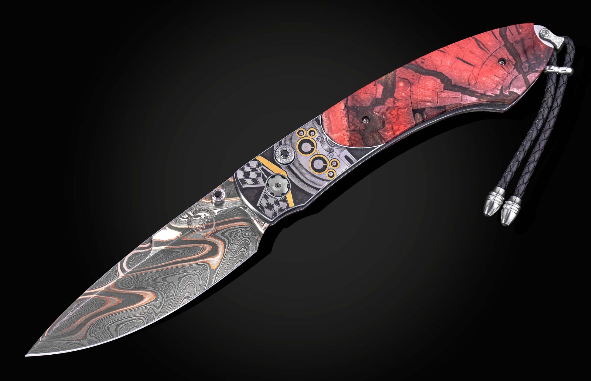 Custom knife with a swirling Damascus blade, a red cracked wood handle, metallic inlays featuring geometric and checkered patterns, and a black leather lanyard.