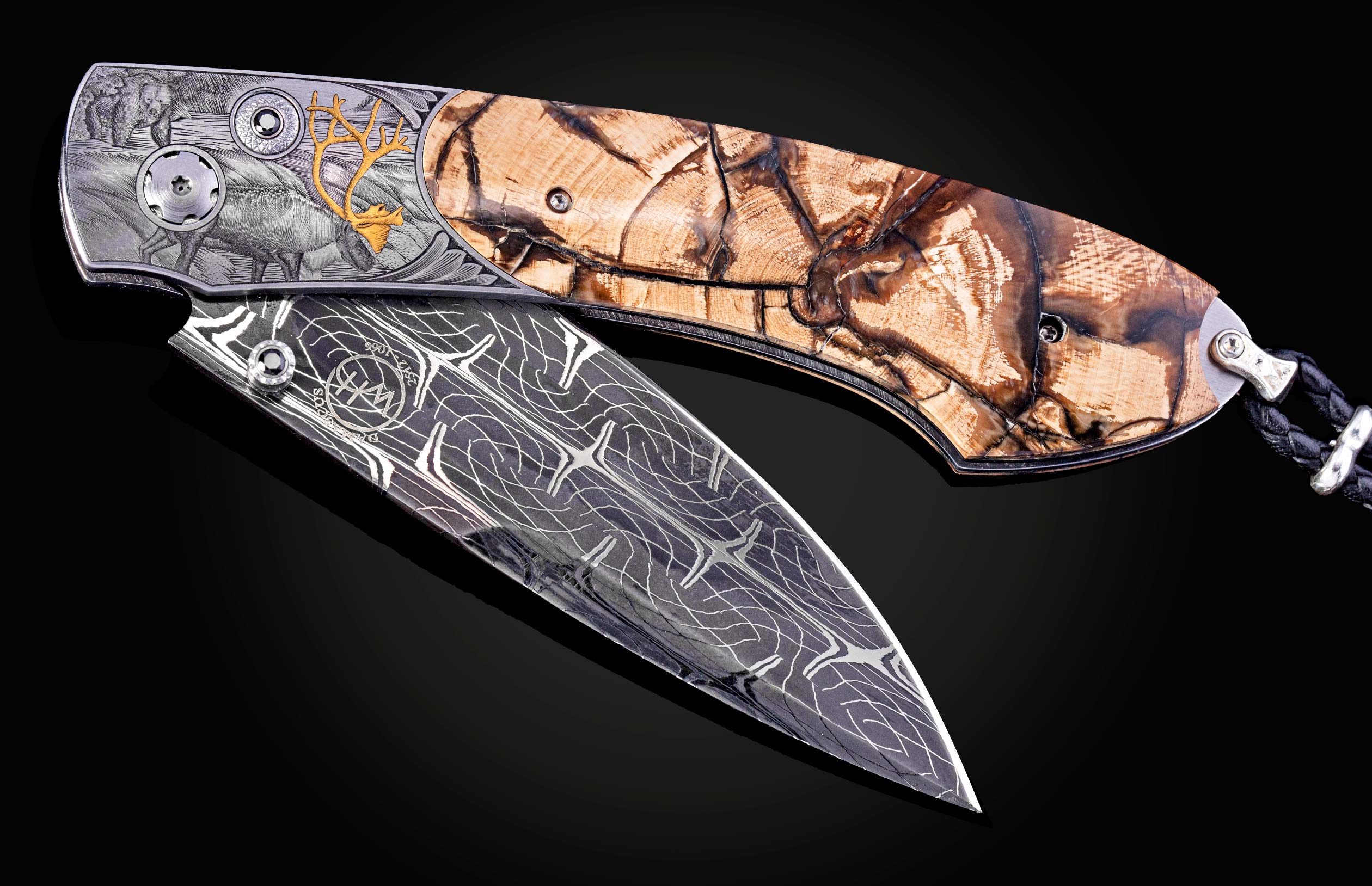 Hand engraved knife with Alaskan game animals, wooly mammoth tusk and damascus steel