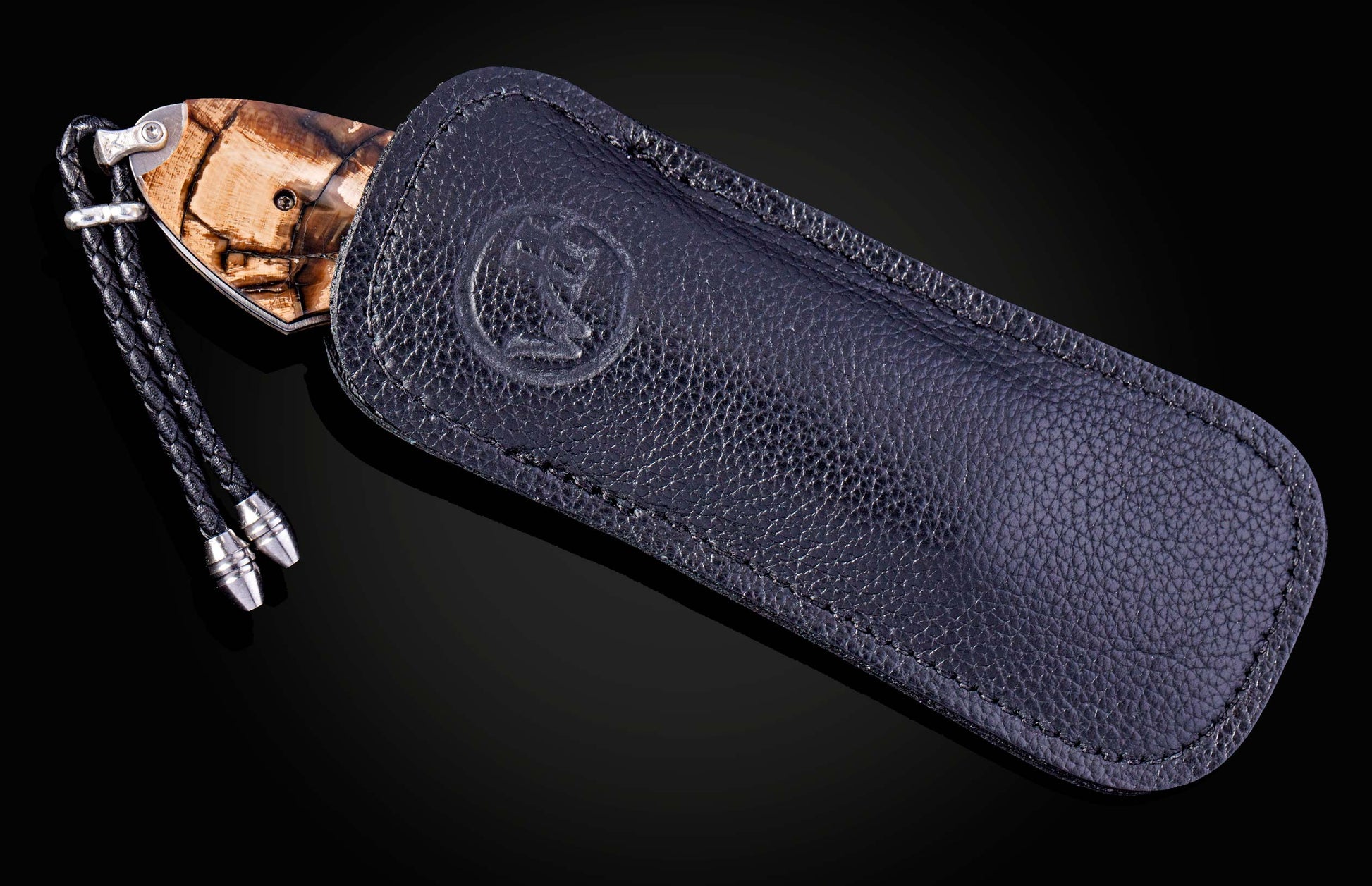 Hand engraved knife with Alaskan game animals, wooly mammoth tusk and damascus steel