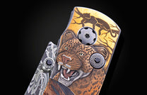 Foldable knife with fossil mammoth tusk, hand engraving, and damascus blade on a black background