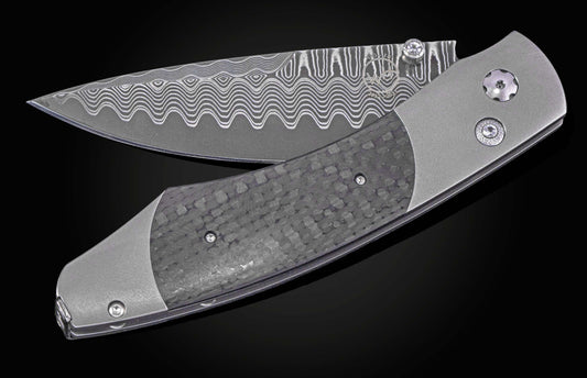 Folding knife with a dark, textured carbon fiber handle, grey titanium frame, and wavy patterned Damascus blade, partially open on a black background.