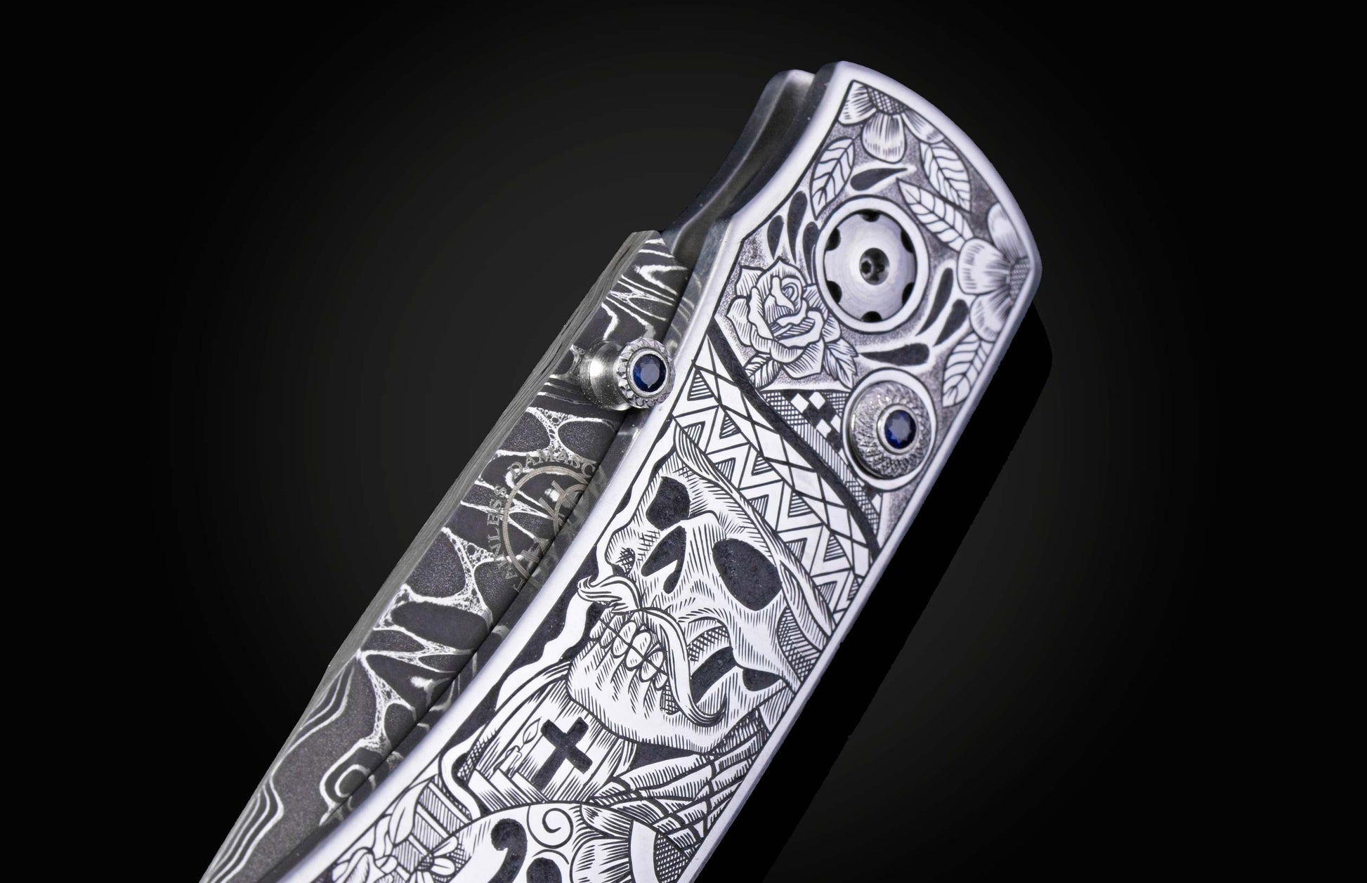 Decorative knife with intricate patterns on a dark background