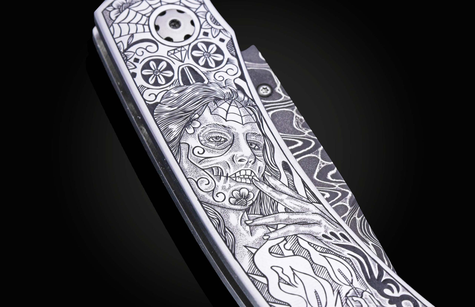 Decorative knife with intricate patterns on a dark background