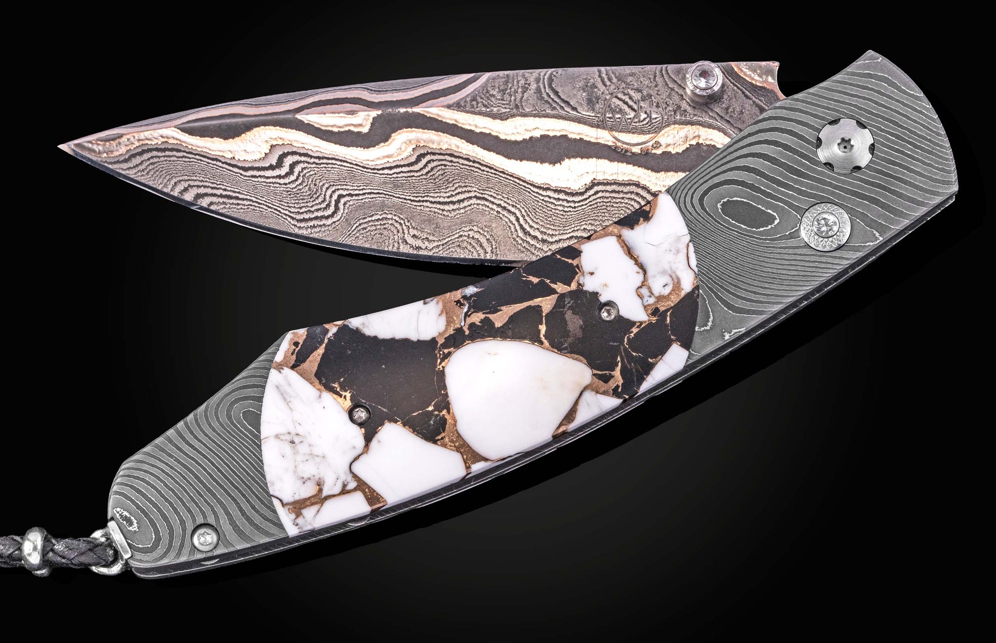 Luxury Damascus steel knife with black and white marbleized handle, by B12, featuring wave-pattern blade and textured grip, side view on black background