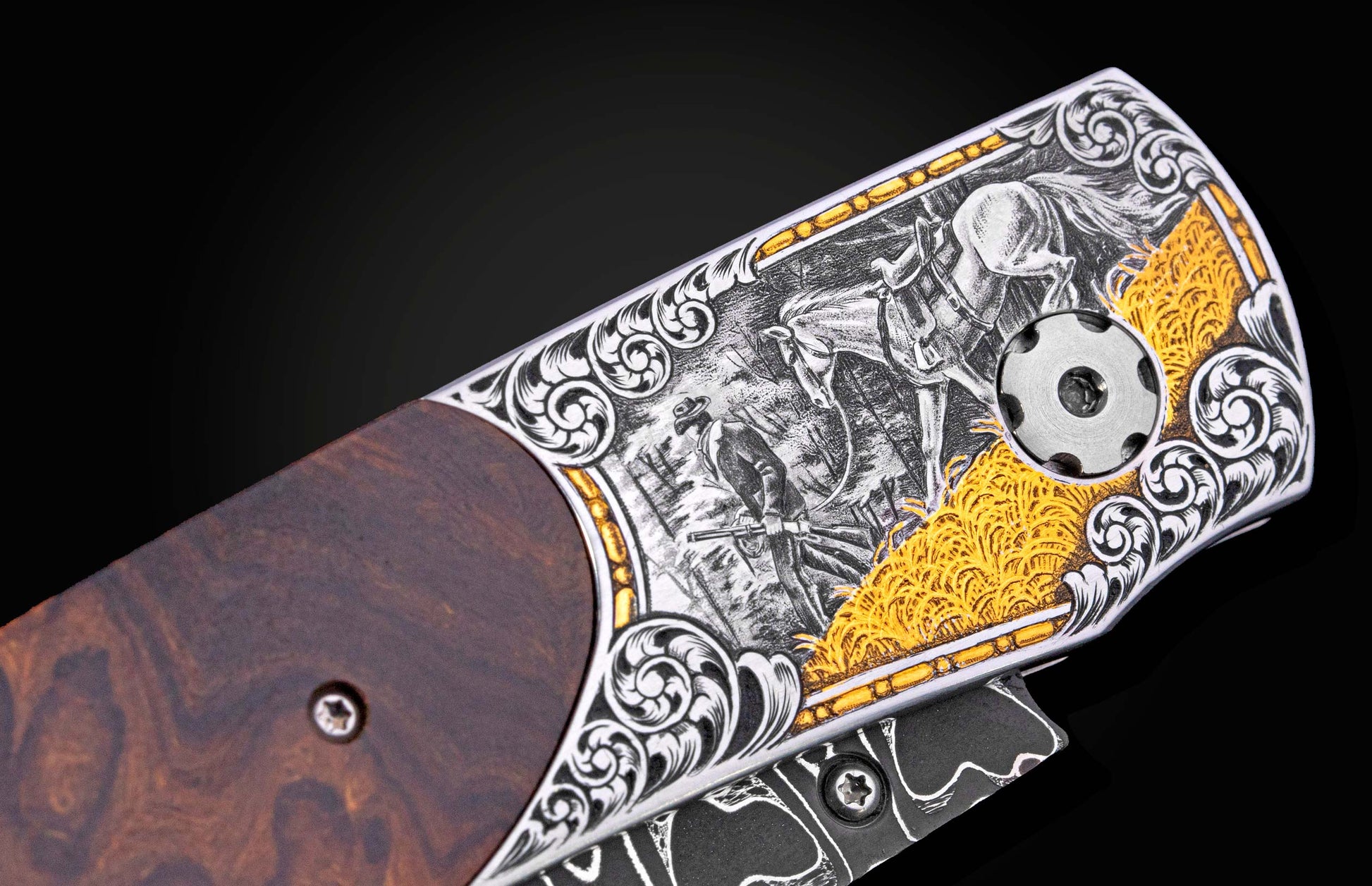 Engraved folding knife with dark wood and silver-toned metal handle, featuring a hunter, horse, and gold wheat scene.