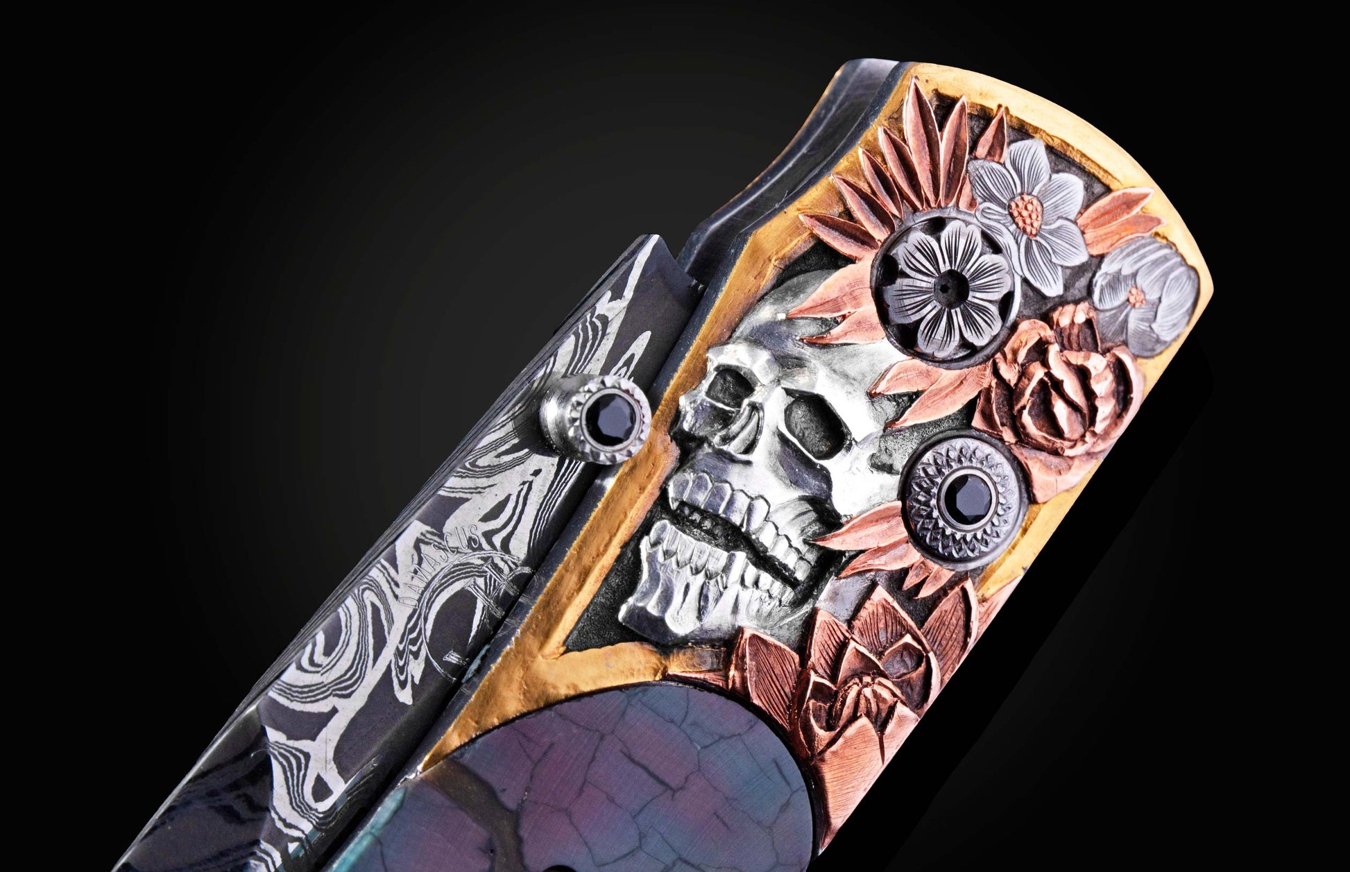 Hand engraved knife with fossil mammoth tusk on a black background