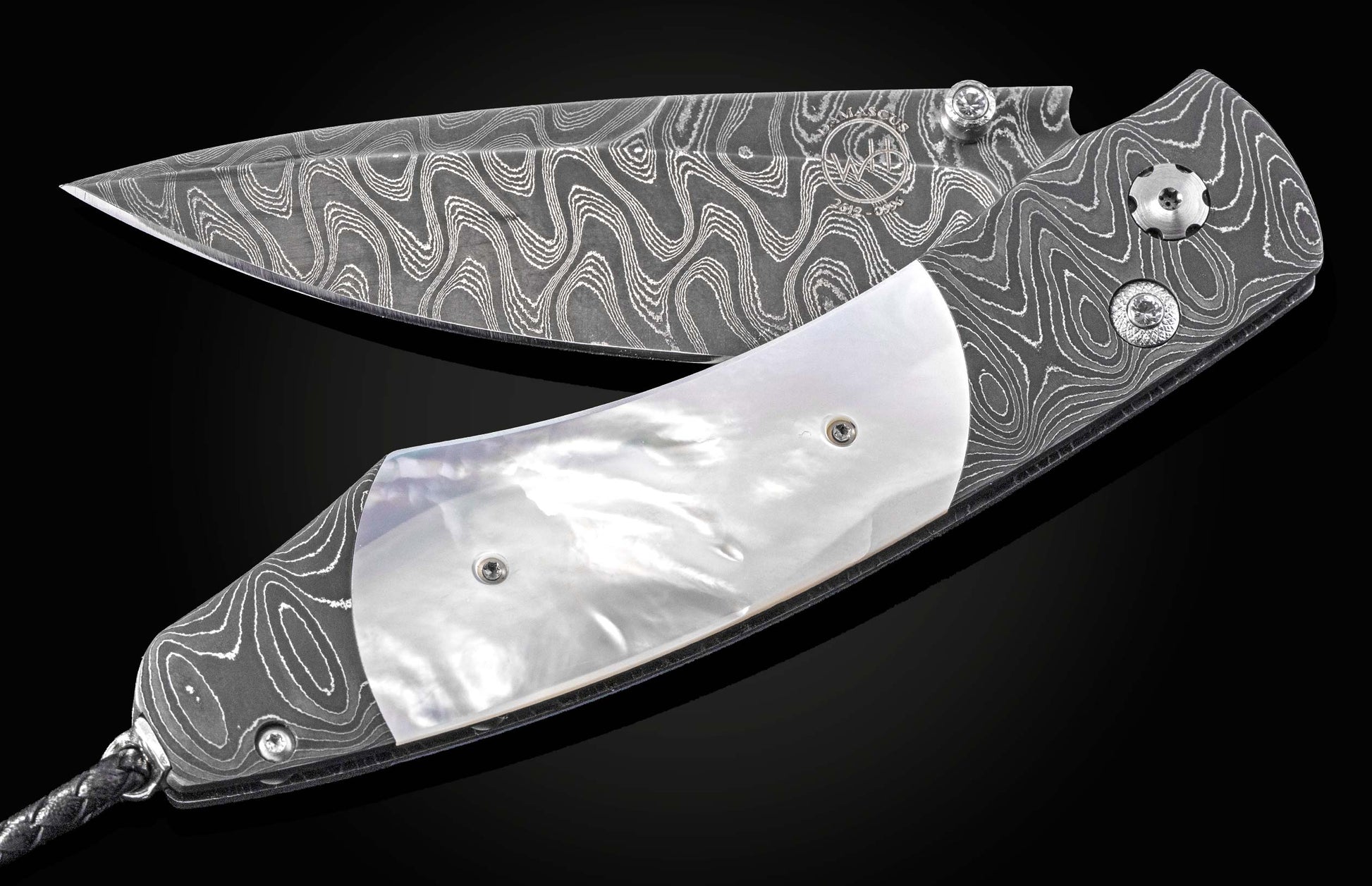 Damascus steel folding knife with wavy pattern and mother-of-pearl inlay by B12, side view on black background