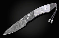 Damascus steel knife with mother-of-pearl inlay and braided lanyard by B12, side view on black background