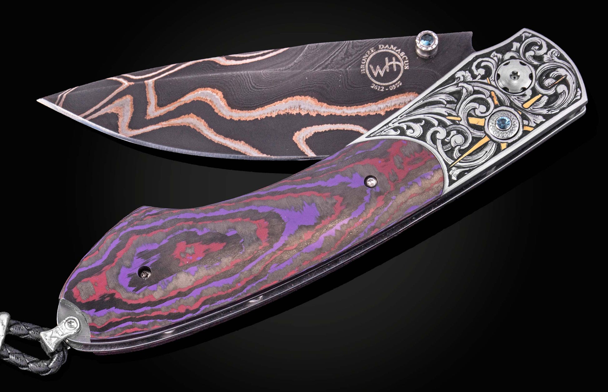 Luxury folding knife with bronze damascus blade and purple-red marbled handle, by William Henry, featuring intricate silver filigree and sapphire accents, side view on black background