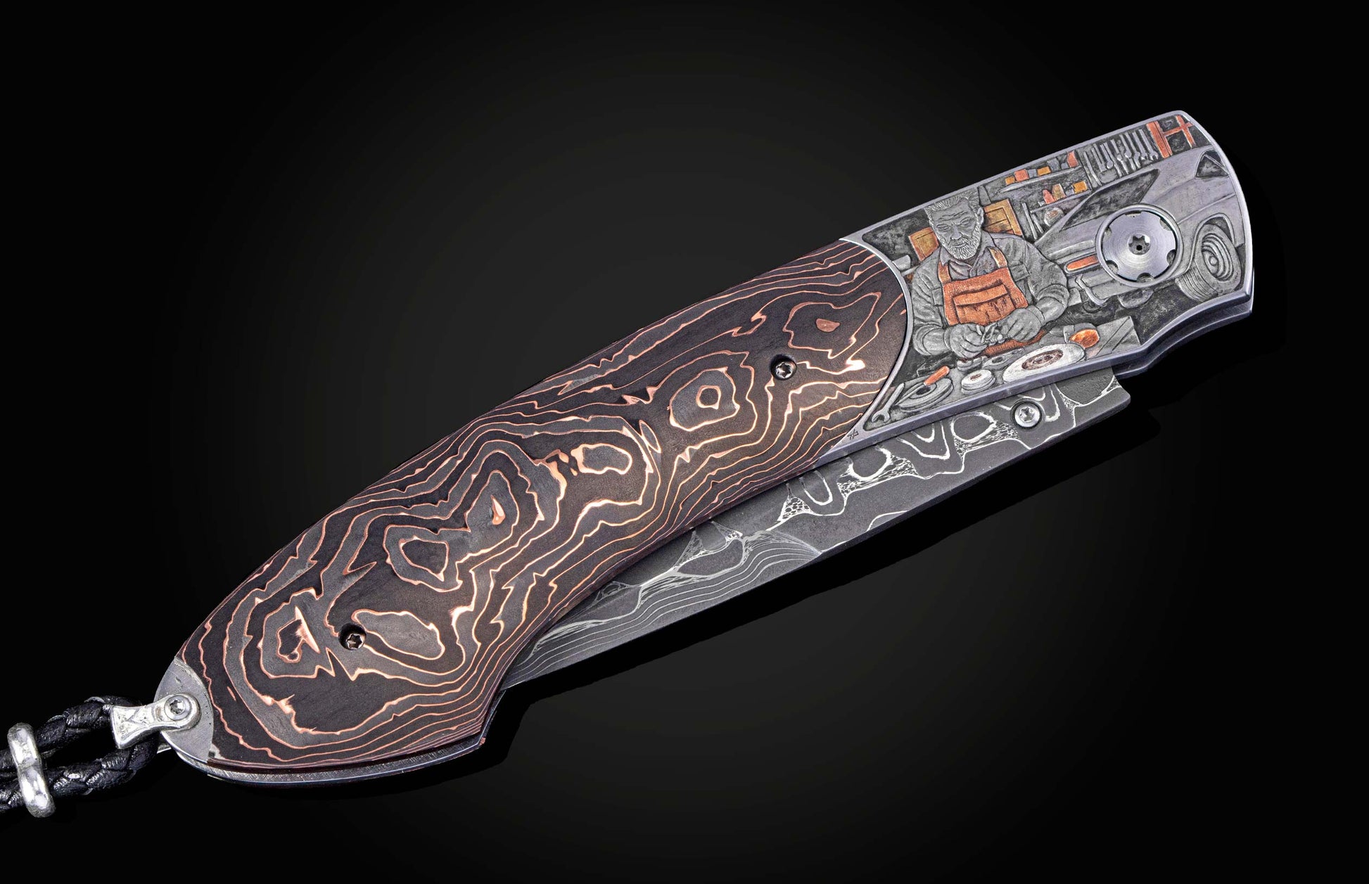 Folding knife with Damascus steel blade and hand engravings on a black background