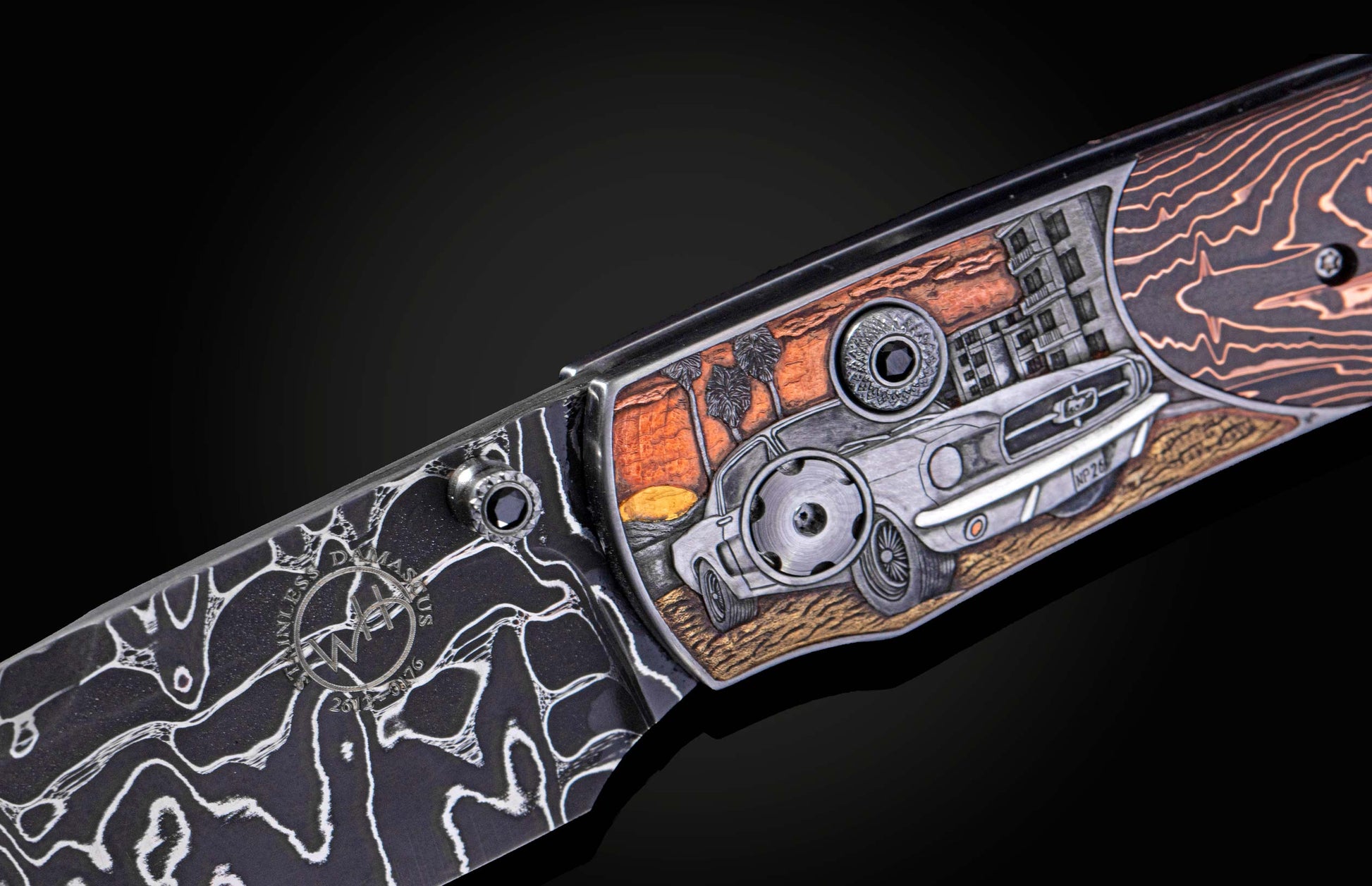 Folding knife with Damascus steel blade and hand engravings on a black background