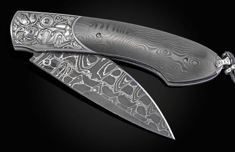 Hand engraved William Henry knife with carbon fiber and damascus steel