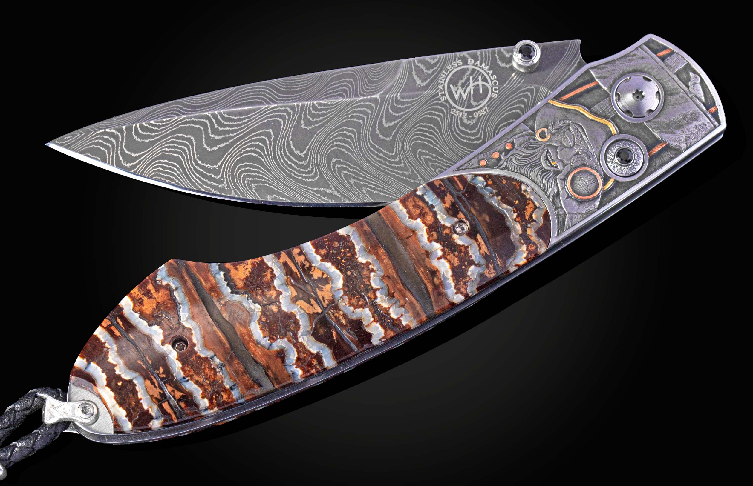 Hand engraved knife depicting pirates with fossil mammoth tooth handle and damascus blade shown partially open