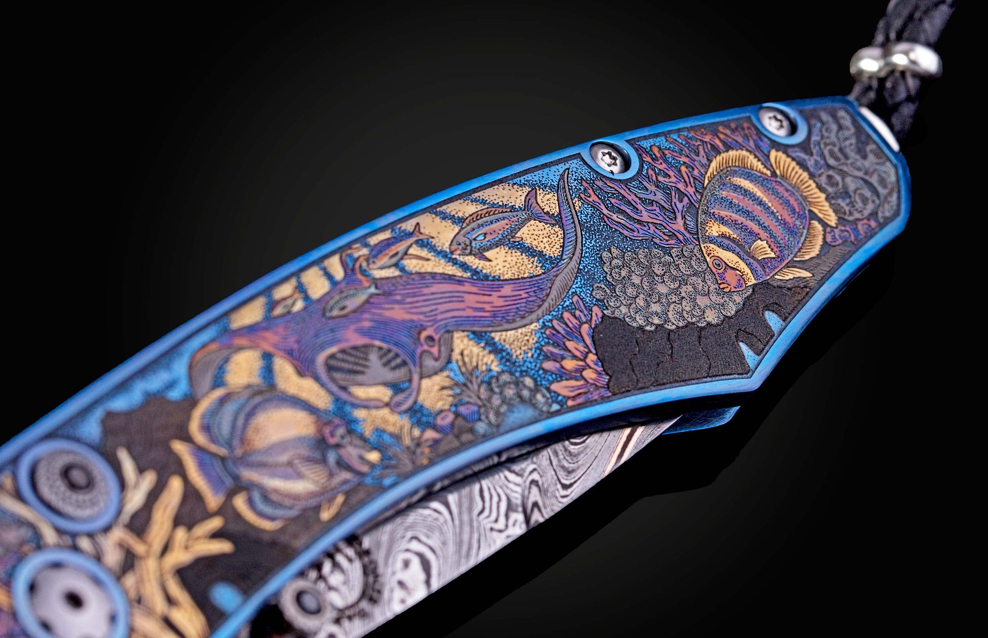 Color laser engraved William Henry Knife with damascus steel blade showing sea life