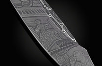 Engraved metal knife with a detailed Western saloon scene featuring a woman, a "Saloon" sign, and a man drinking.