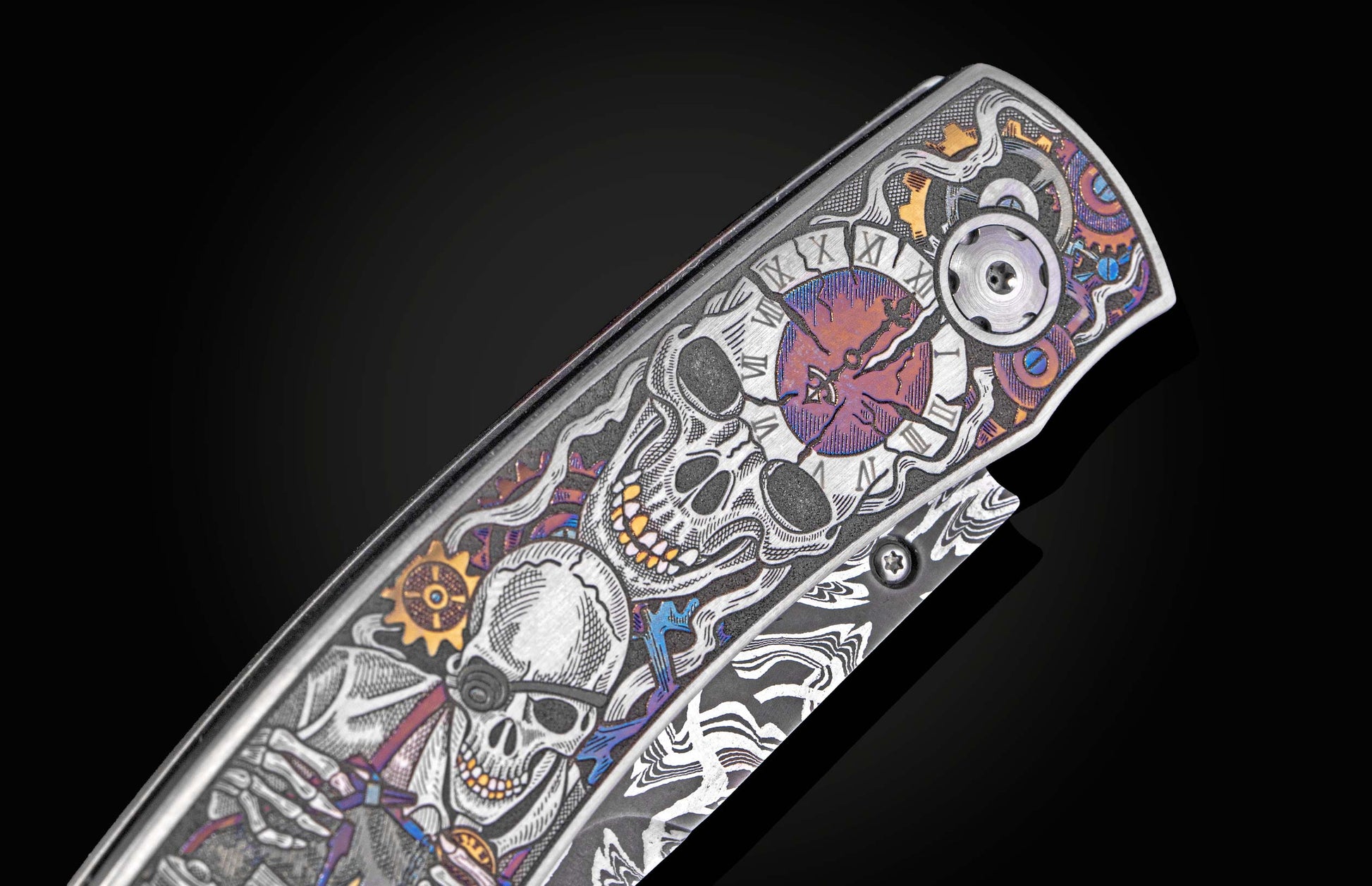 Decorative knife with intricate designs on a black background