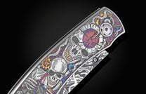 Decorative knife with intricate designs on a black background