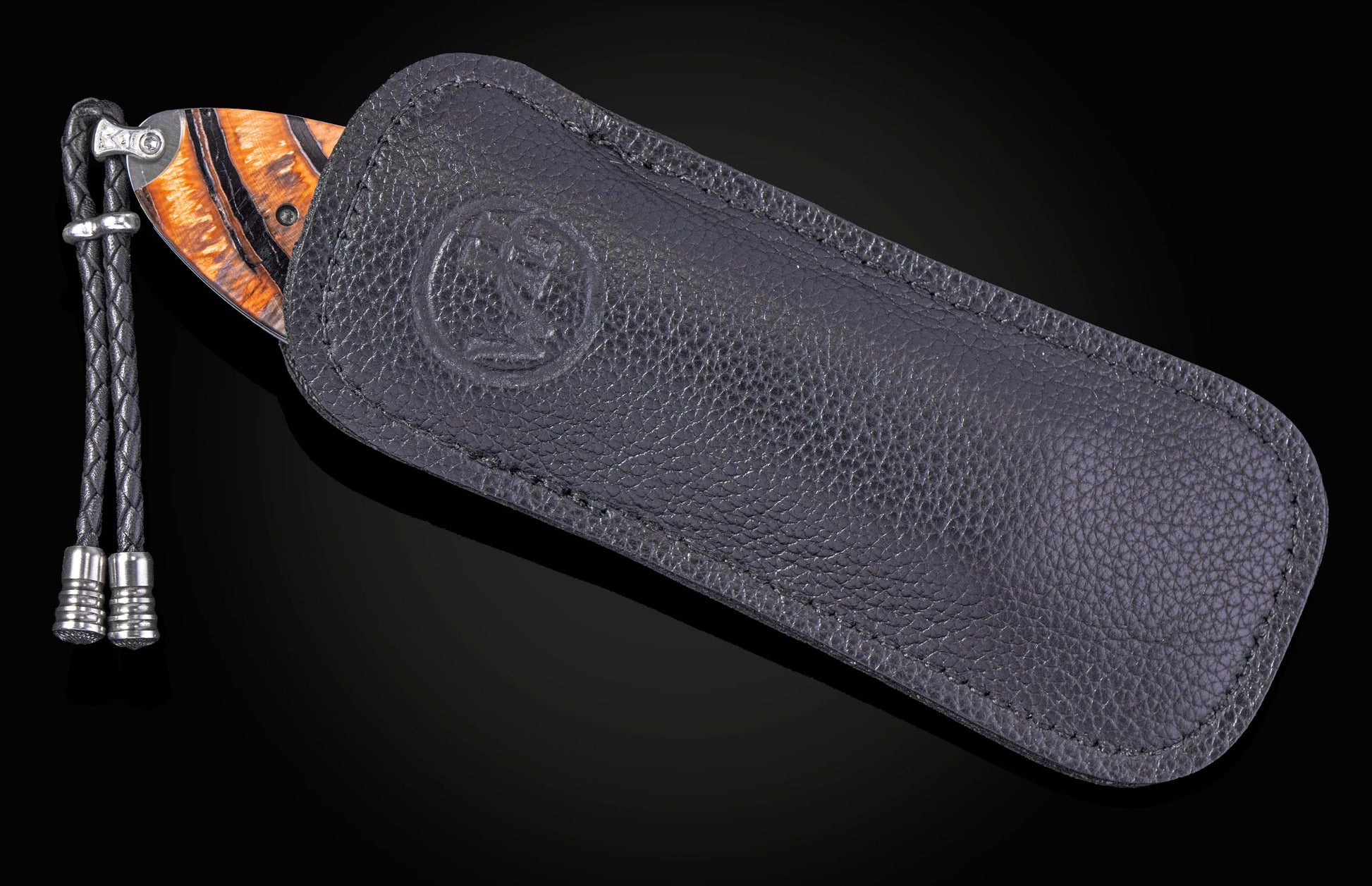 William Henry knife with woolly mammoth tusk, hand engraving, and damascus steel blade.