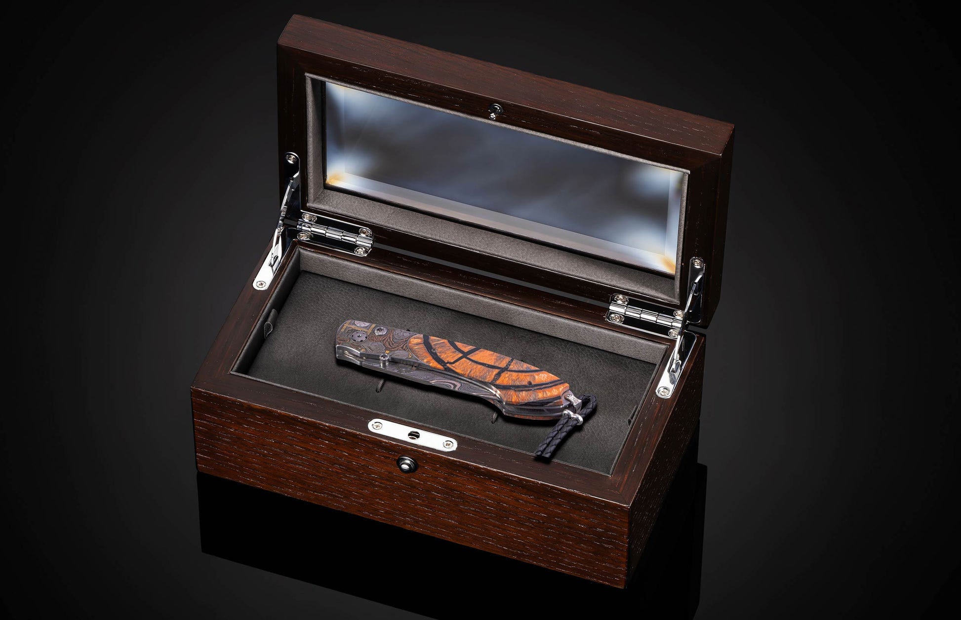 William Henry knife with woolly mammoth tusk, hand engraving, and damascus steel blade.