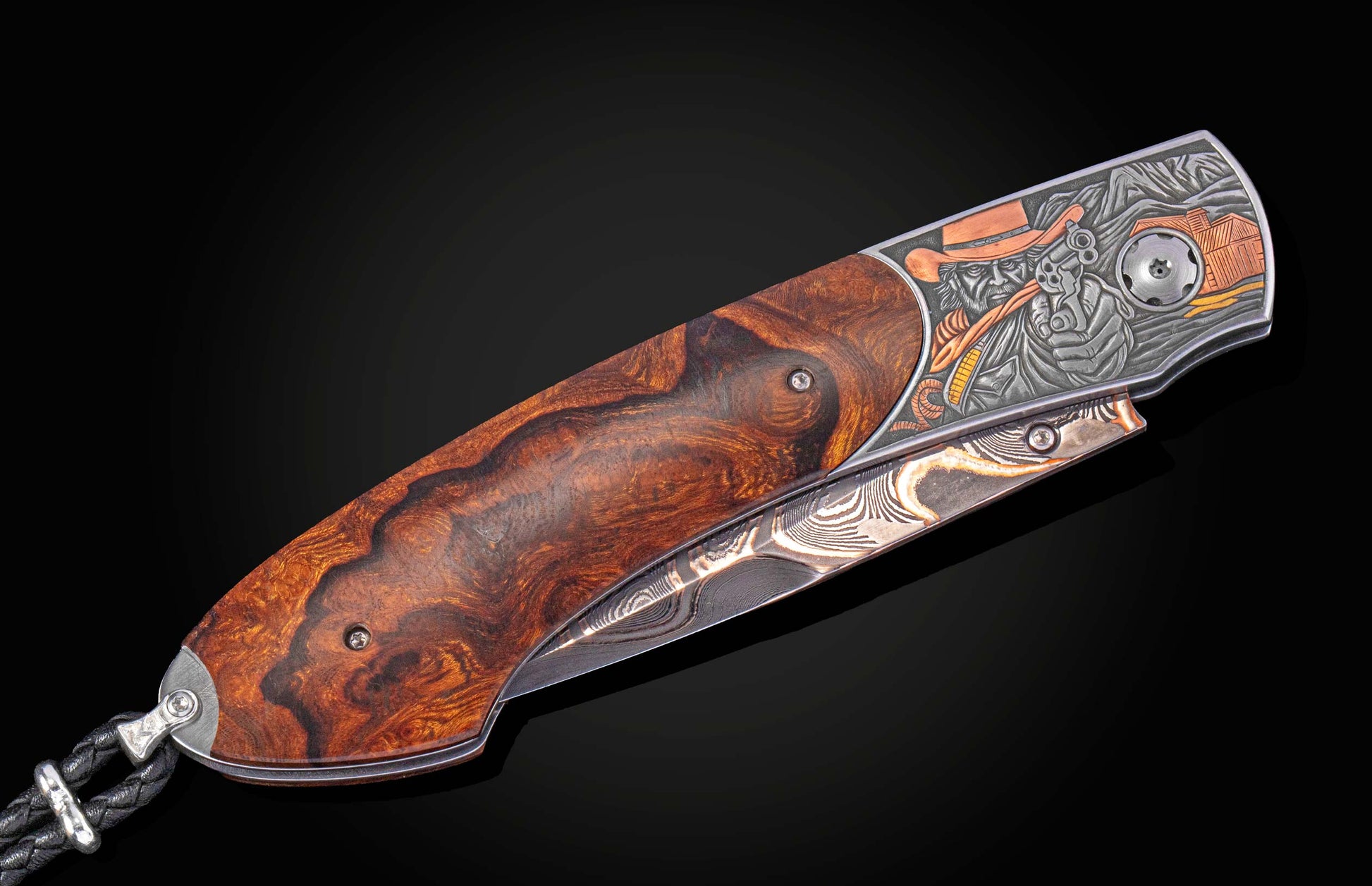 Western-themed folding knife with a rich wooden handle, engraved metal frame depicting a cowboy and gun, and a patterned Damascus steel blade.