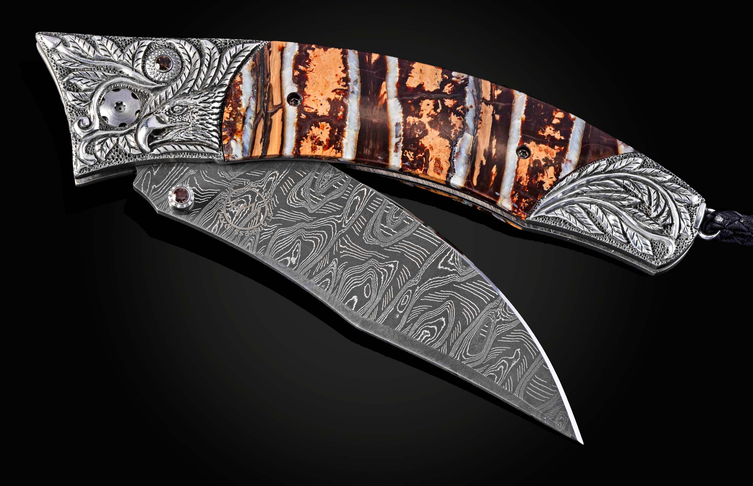 Decorative knife with ornate handle and blade on a dark background