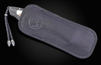 William Henry folding knife with damascus steel and white turquoise in bornze.