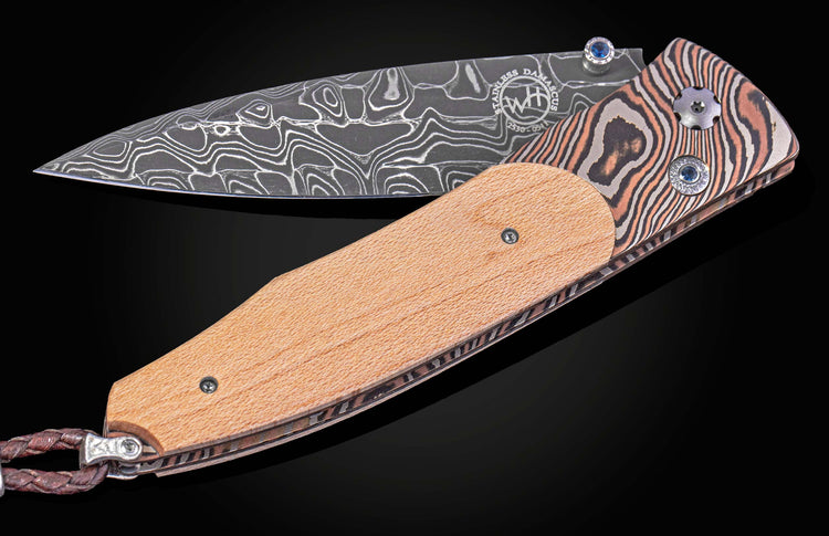 William Henry knife with wood from Yankee Stadium, Mokume Gane frame, and damascus blade