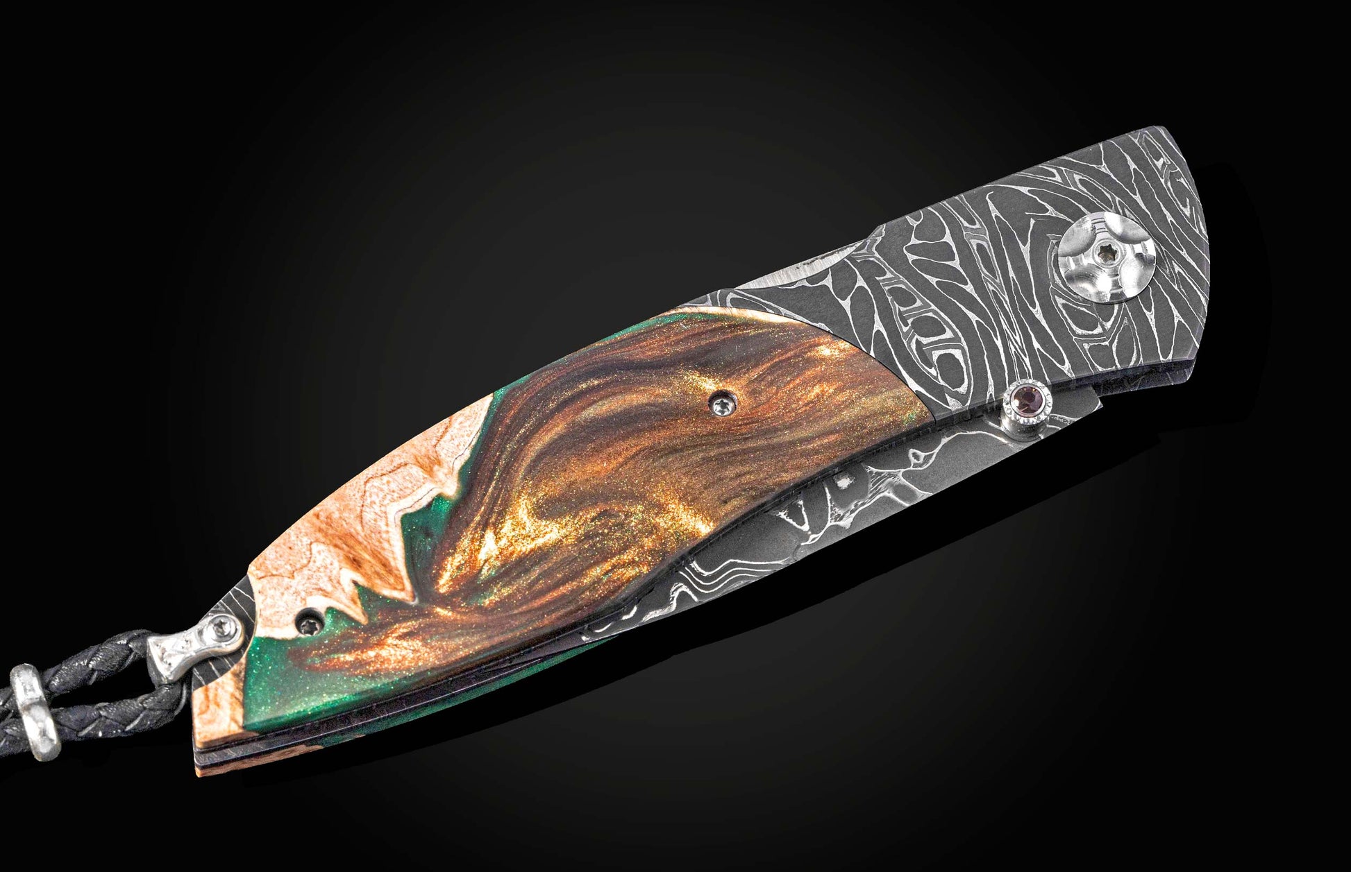 Decorative knife with wooden handle and metal blade on a black background
