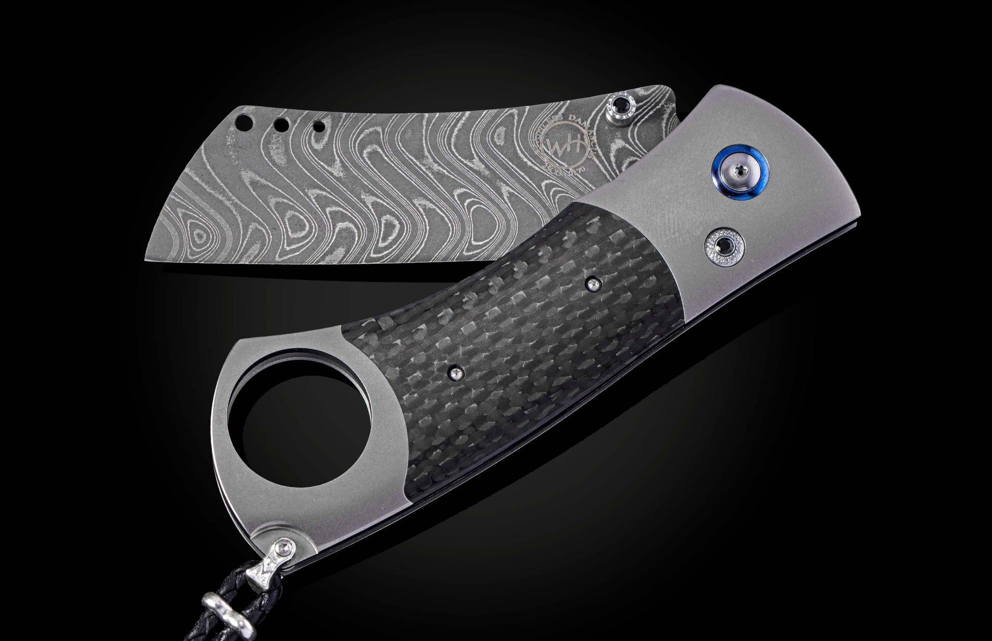 Titanium, carbon fiber, and damascus steel cigar cutter from William Henry