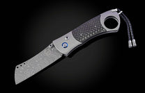 Titanium, carbon fiber, and damascus steel cigar cutter from William Henry