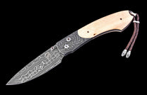 Folding knife with wooden handle and damascus steel blade on a black background