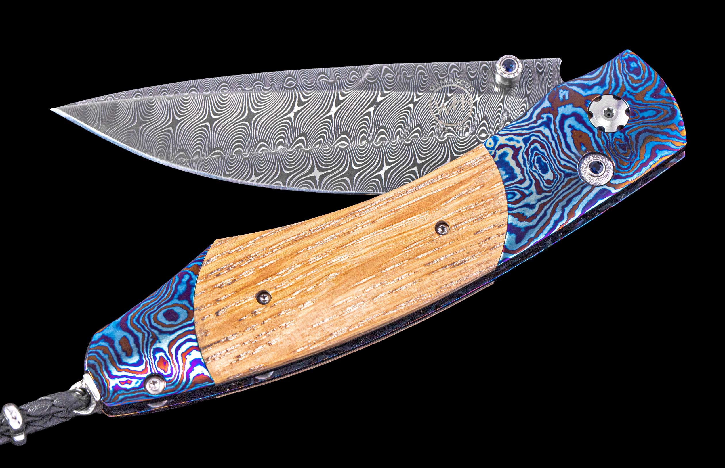 Folding knife with wooden handle and decorative blade on a black background