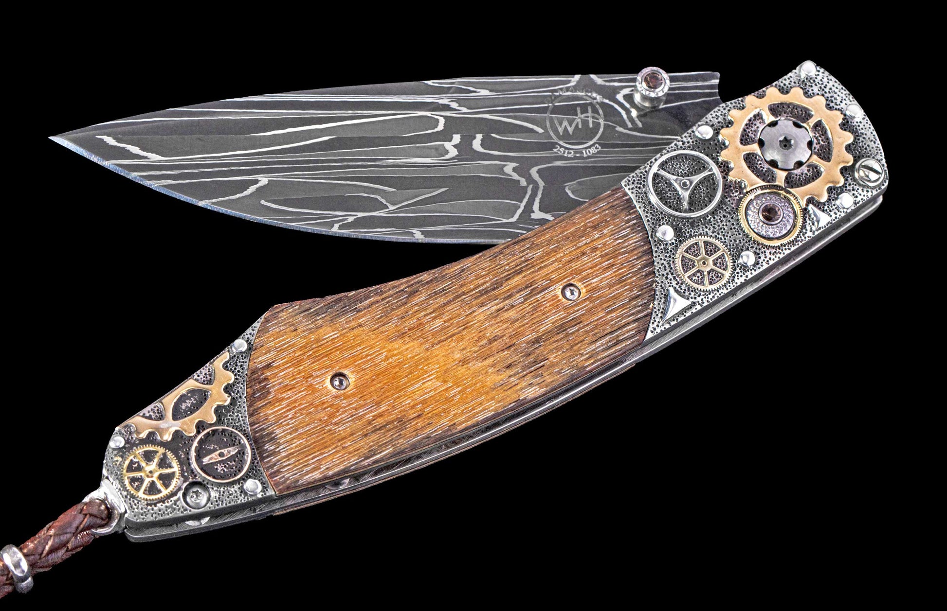 Decorative folding knife with wooden handle and metal embellishments on a black background