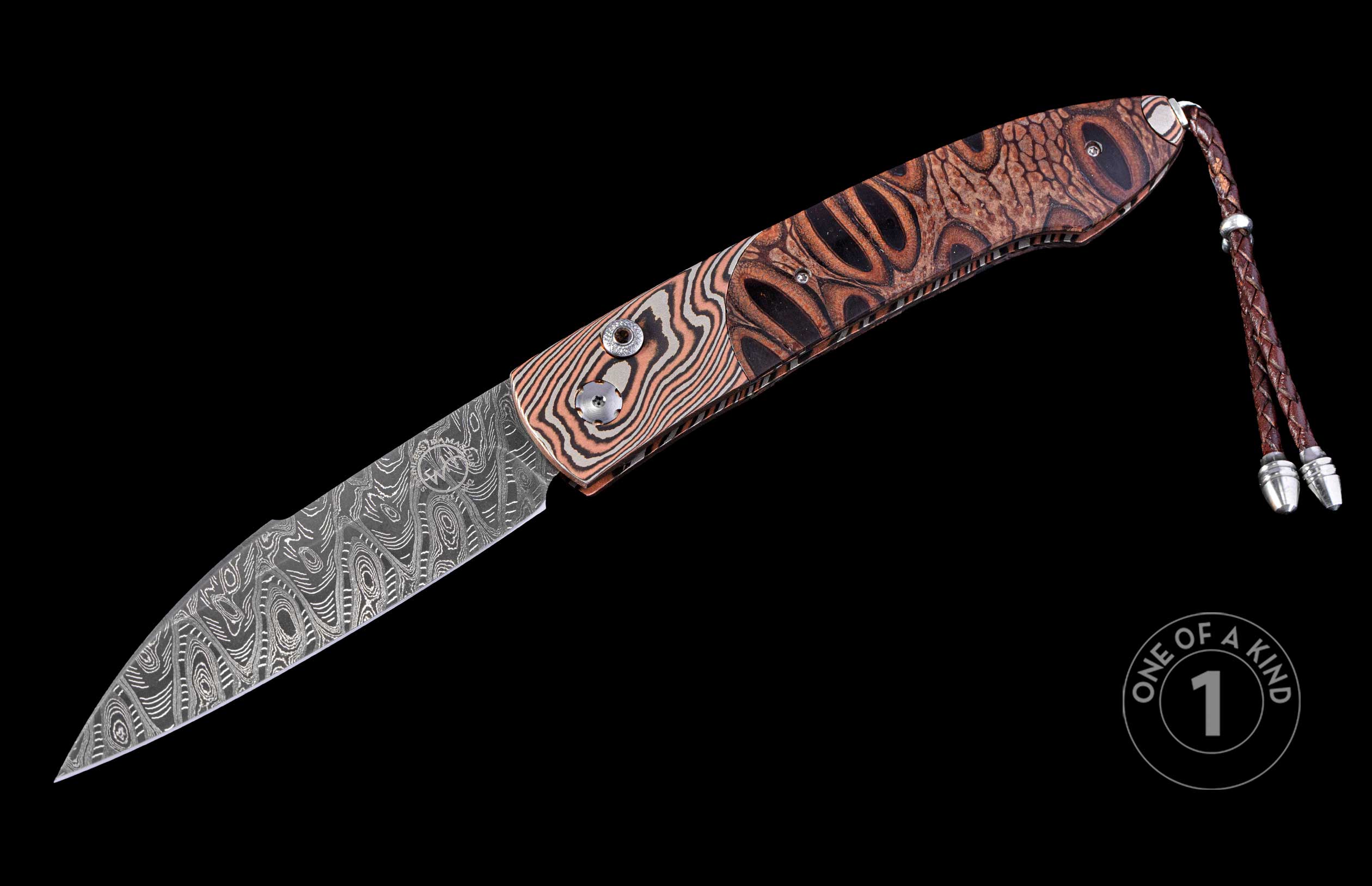 Auto knife with a Damascus steel blade, organic brown and black patterned handle, and braided leather lanyard.