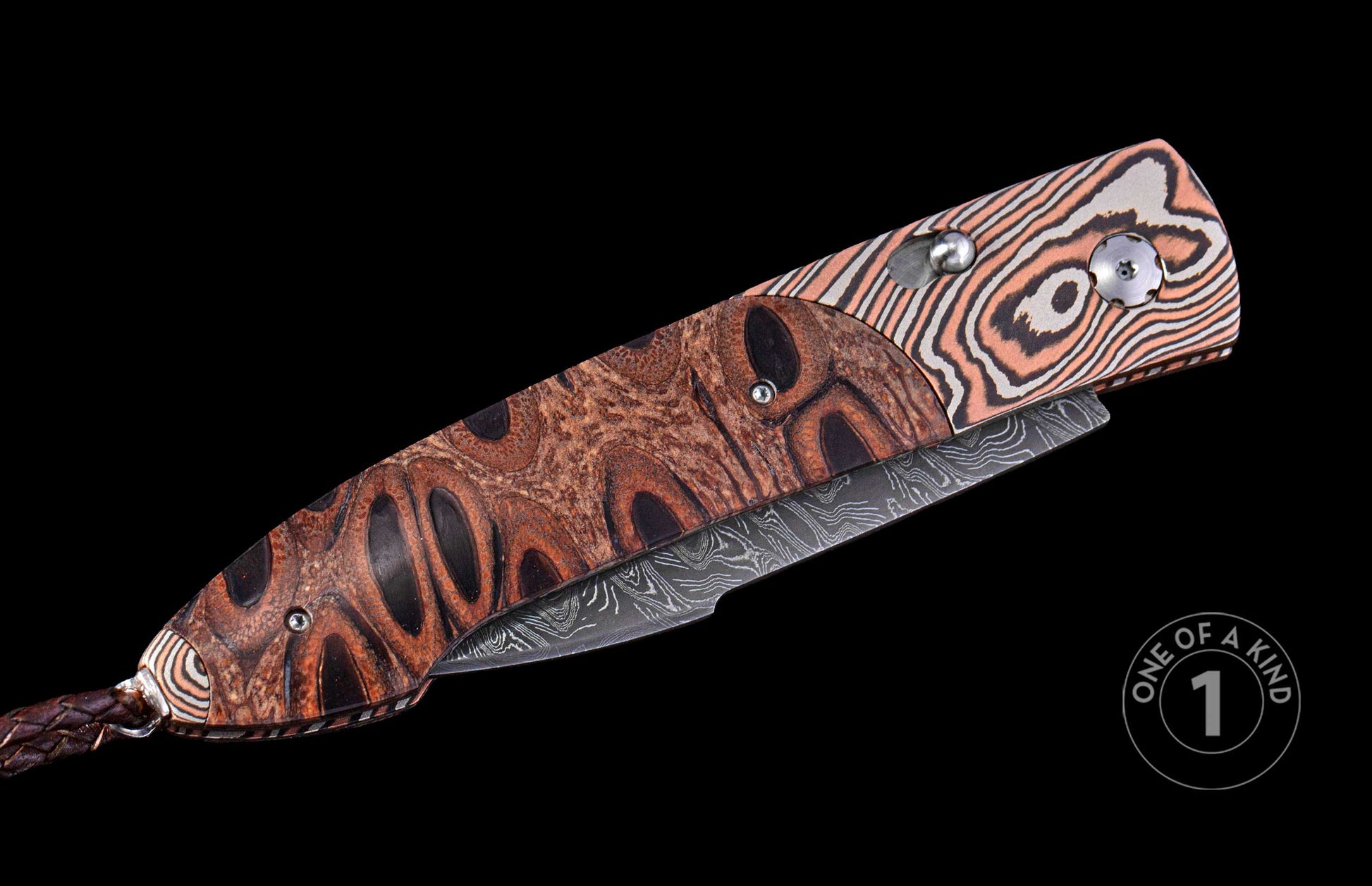 Closed automatic knife with brown exotic wood handle, black oval patterns, copper and silver Damascus bolster, Damascus steel blade, and braided leather lanyard.