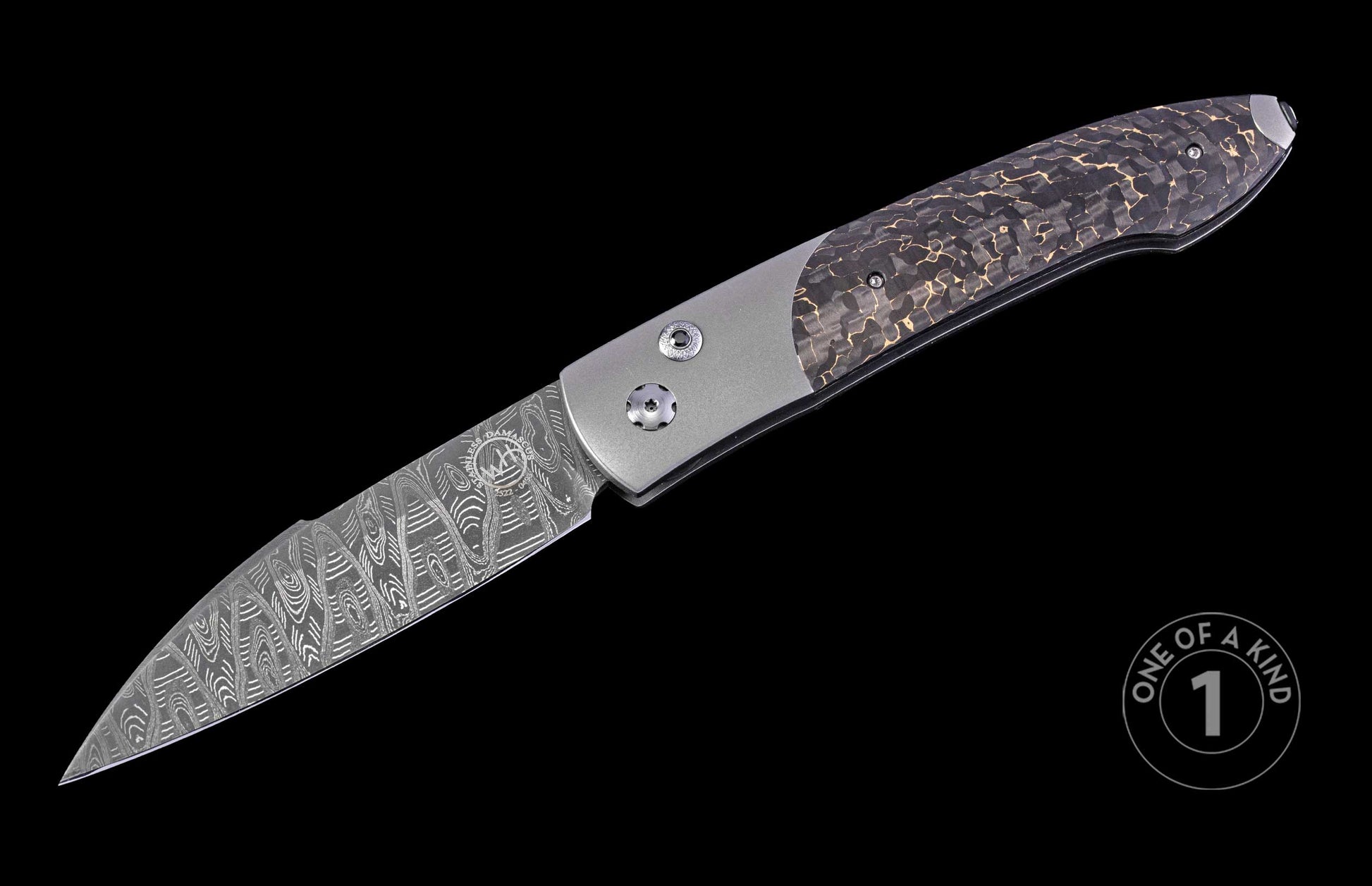 Automatic knife with stainless Damascus steel blade, silver frame, and dark handle with gold shattered pattern.