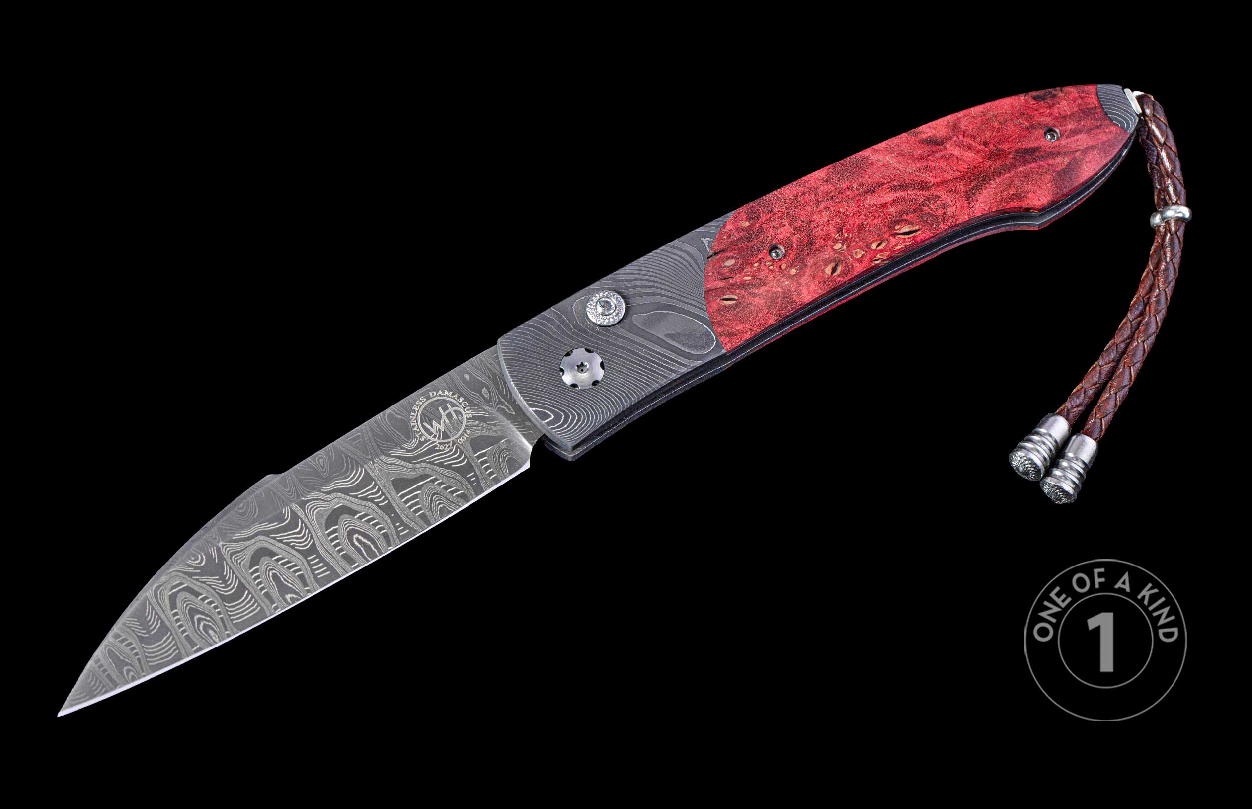 Automatic folding knife with red burl wood handle, Damascus steel blade, brown braided leather lanyard, and 'ONE OF A KIND 1' emblem.