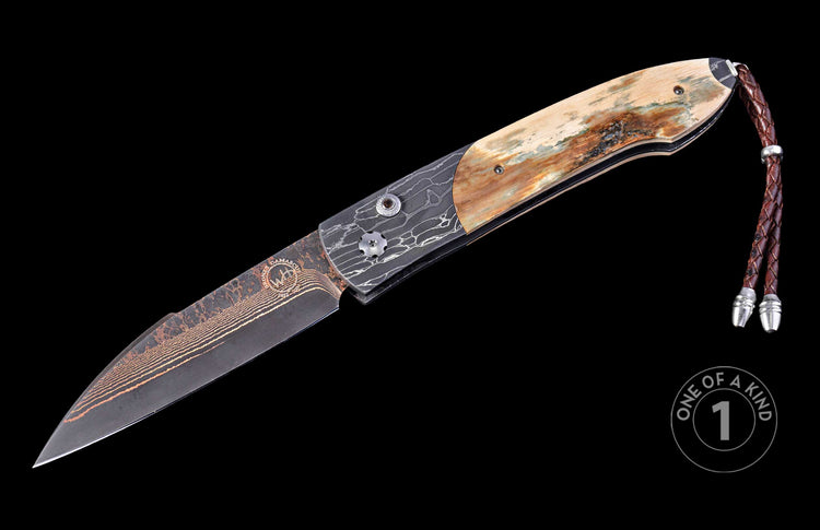 Bronze Damascus folding knife with layered blade pattern, marbled handle scales, and a braided brown leather lanyard.