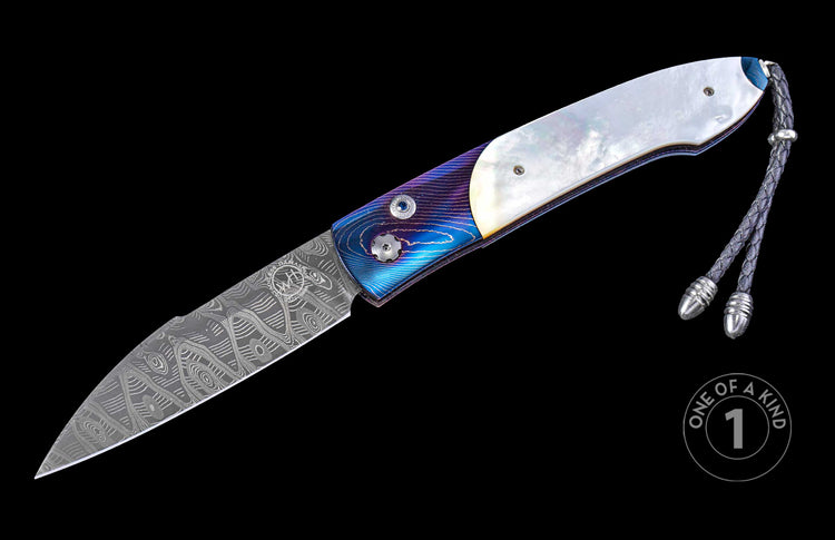 A folding knife with a patterned Damascus steel blade, iridescent mother-of-pearl, and blue/purple titanium accents, with a braided leather lanyard and metal beads.