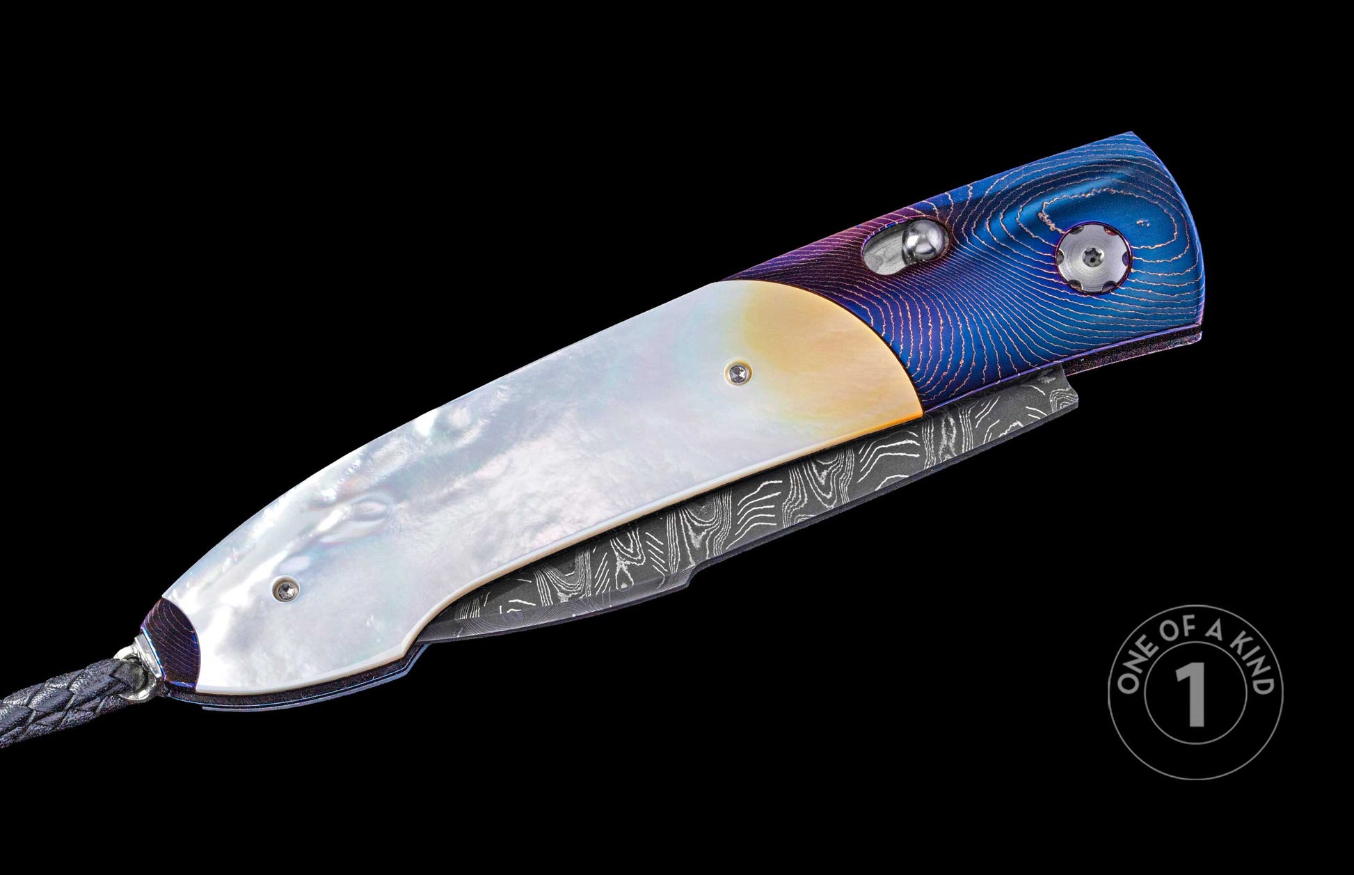 Folding knife with white mother-of-pearl and blue-purple patterned titanium handle, Damascus steel blade, and braided black leather lanyard.