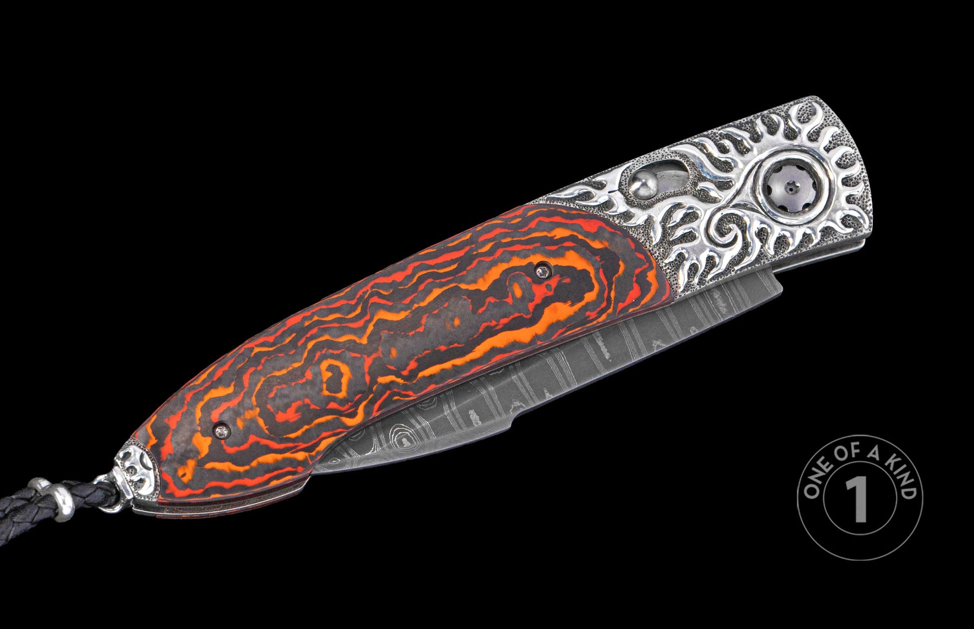 Folding knife with orange and black swirled handle, ornate silver bolsters, Damascus blade, and black braided lanyard.
