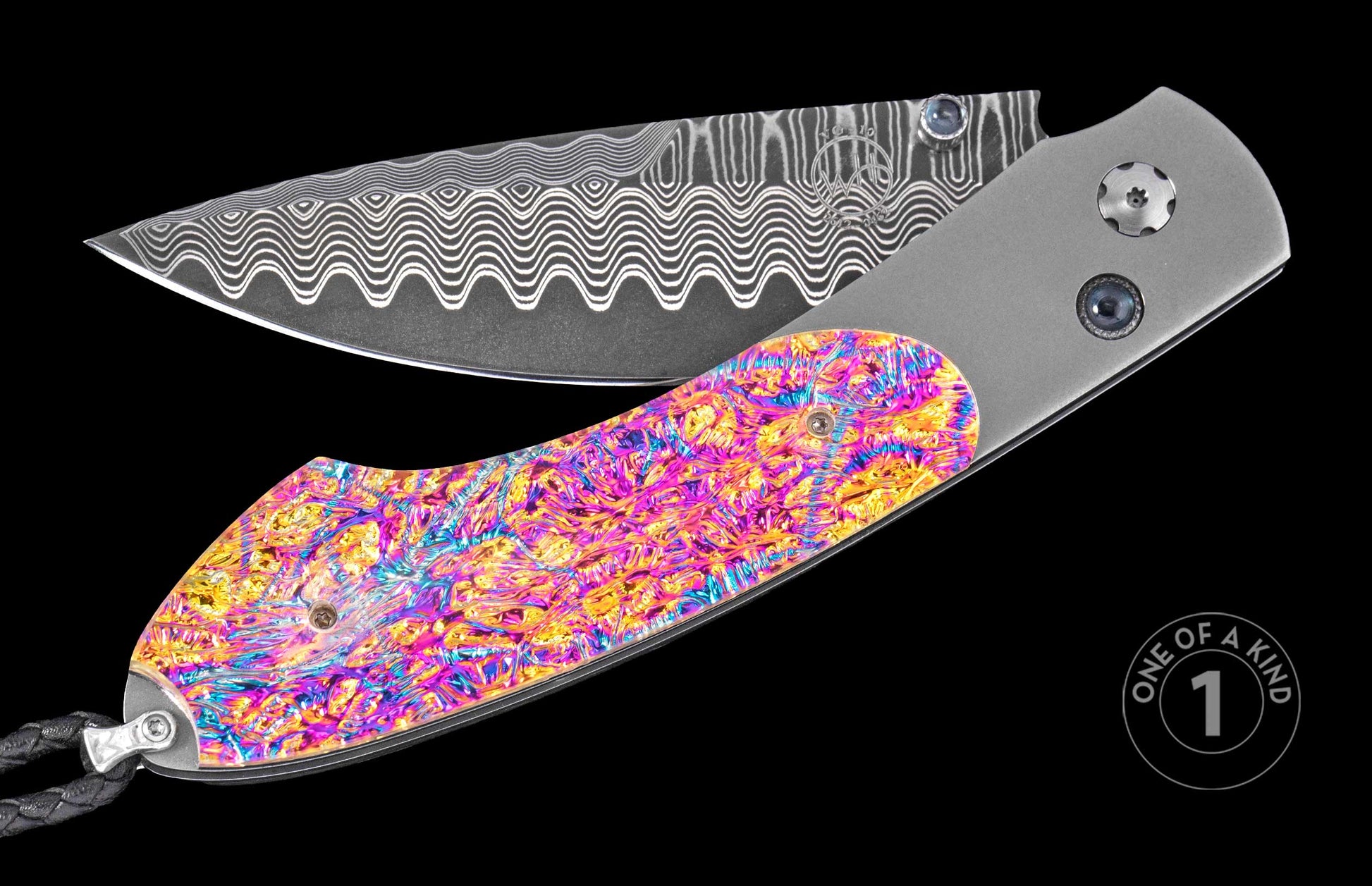 Damascus steel folding knife with vibrant mokume-gane handle, by W. H. Knives, featuring wave-pattern blade and sapphire accents, one-of-a-kind design, side view