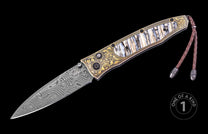 Damascus steel folding knife with marbled bone handle, gold floral inlays, and braided leather lanyard, one of a kind